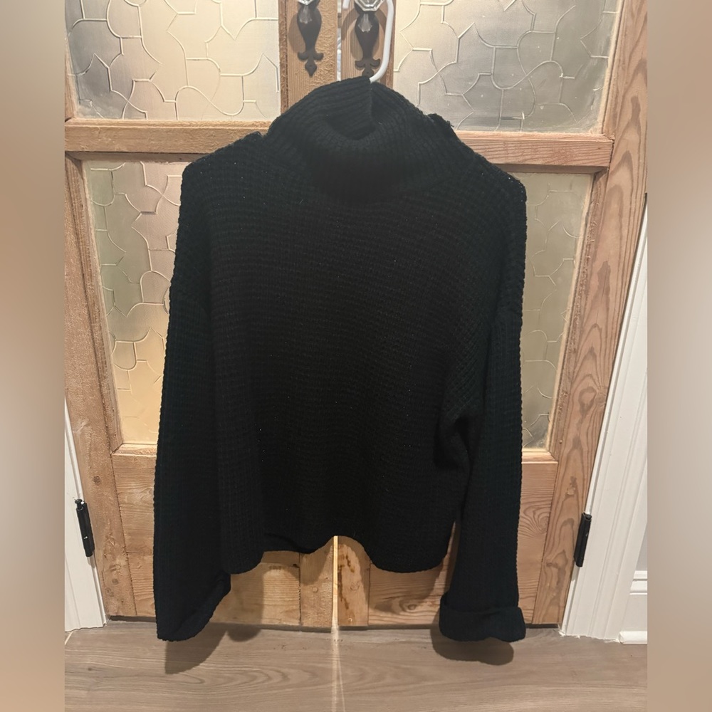 Black sweater slightly cropped